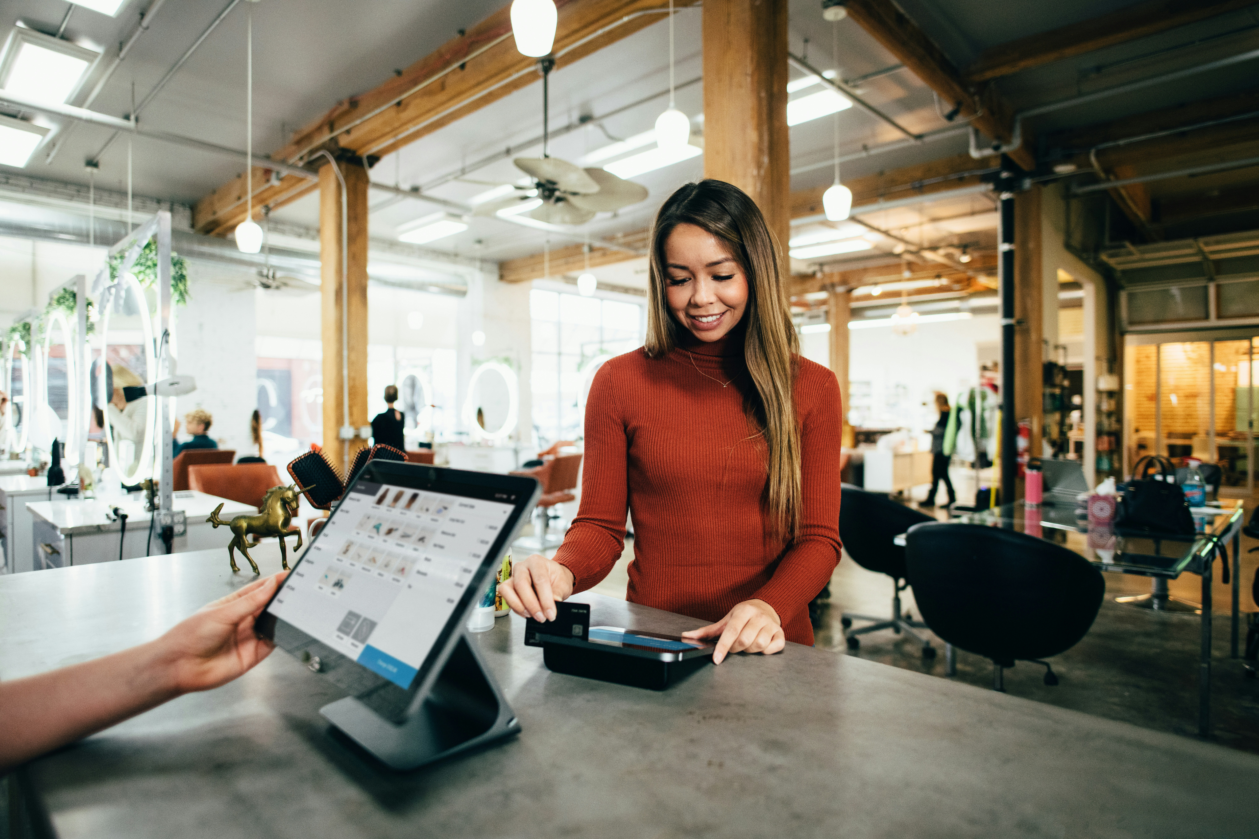 Business owner using NUWINZ